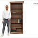 Porträt Vincenz Opel mit seinem Bücherregal als Schreinermeisterstück