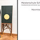 Porträt von Maximilian Bauer mit seinem Schreinermeisterstück "Golden-Wine-Cabinet".